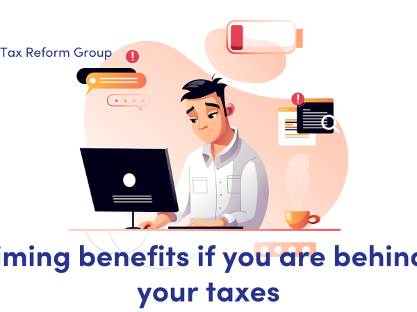News: claiming benefits if you are behind on your taxes. image of a man sat at a computer with a cup of coffee, he has bubbles above his head of everything he is thinking about, too much to do. 
