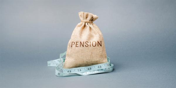 a burlap sack with the word 'PENSION' on the front, around the sack a fabric tape measure can be seen