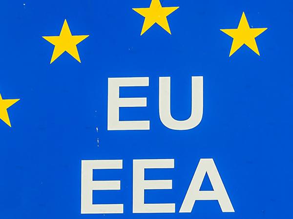 a blue background with 7 yellow stars in an arch pattern, underneath this are the words 'EU' and 'EEA' in white text