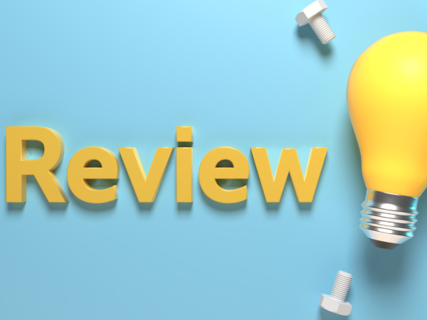 the word 'REVIEW' in yellow text next to a yellow lightbulb surrounded by screws against a blue background