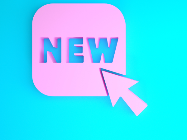 a pink mouse cursor hovering over a pink icon with the word 'NEW' on it, against a blue background. 