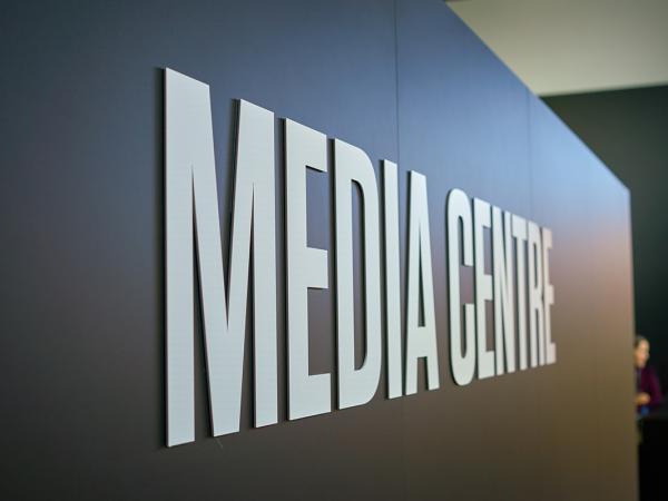 a wall with the words 'MEDIA CENTRE'