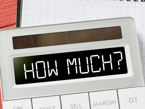 A calculator showing the words 'HOW MUCH?'.