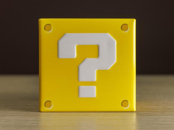 A yellow box with a white question mark on the front. 