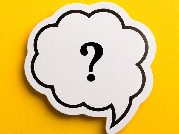A yellow background with a white speech bubble containing a question mark. 