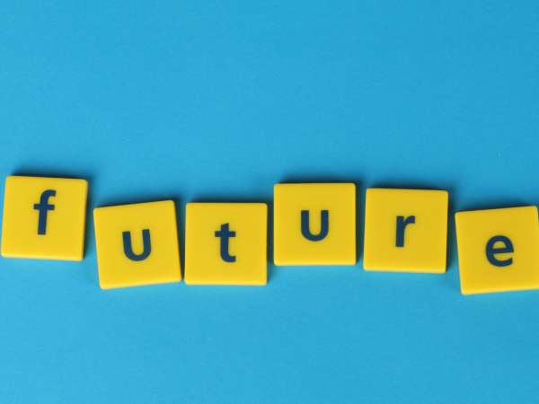 Yellow letter tiles spelling out the word 'FUTURE' 