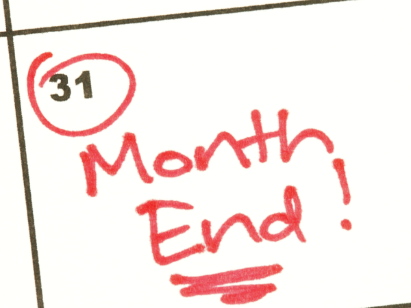 Calendar showing 31st of the month which is circled in red with the words 'MONTH END!' written in red ink.