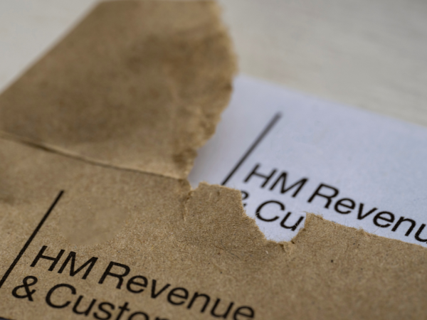 An open HMRC envelope and letter showing the HMRC logo in the top left corner.