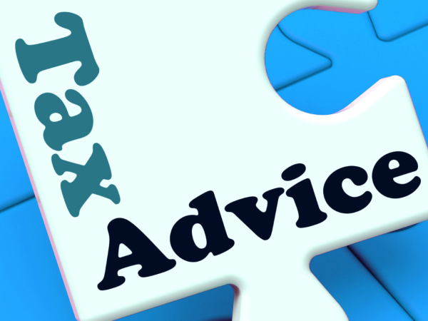 A jigsaw piece with the words 'TAX ADVICE' printed on it.