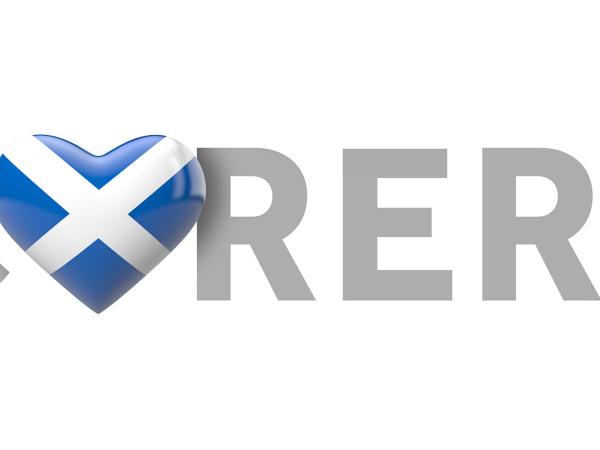 Image of the word carers with a heart with a Scottish flag replacing the A
