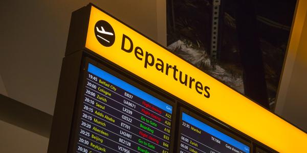 Airport screen showing 'DEPARTURES'