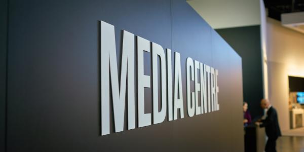 a wall with the words 'MEDIA CENTRE'