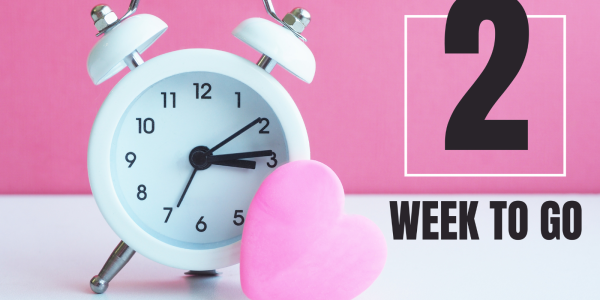 a clock and a love heart against a white and pink background with the words '2 WEEK TO GO' in black text.