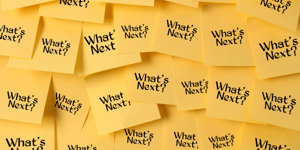 a bunch of post-it notes all with the same words written on them saying 'WHAT'S NEXT?'