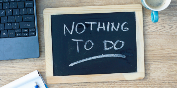Chalk board with the words 'NOTHING TO DO' written in white chalk. 