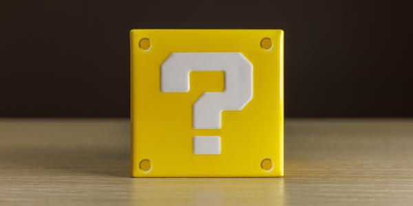 A yellow box with a white question mark on the front. 