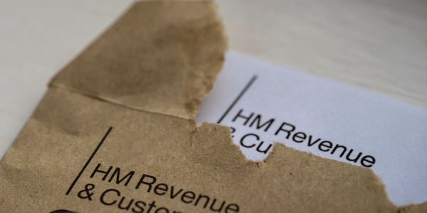 An open HMRC envelope and letter showing the HMRC logo in the top left corner.